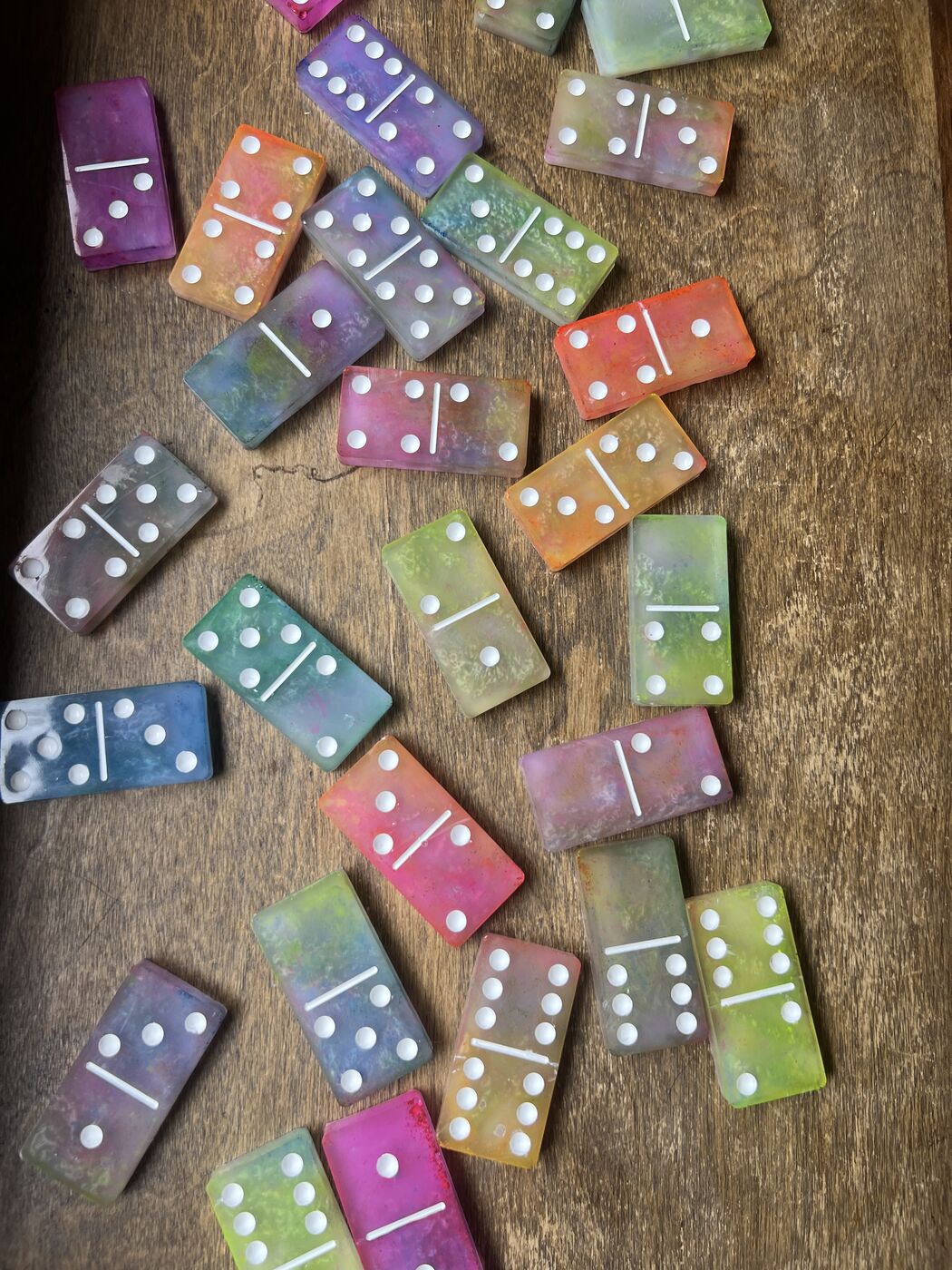 Frosted rainbow resin dominoes with white pips